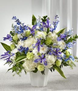 Funeral floor baskets - Low-profile floral arrangements placed around the venue, offering warmth and comfort during a time of mourning